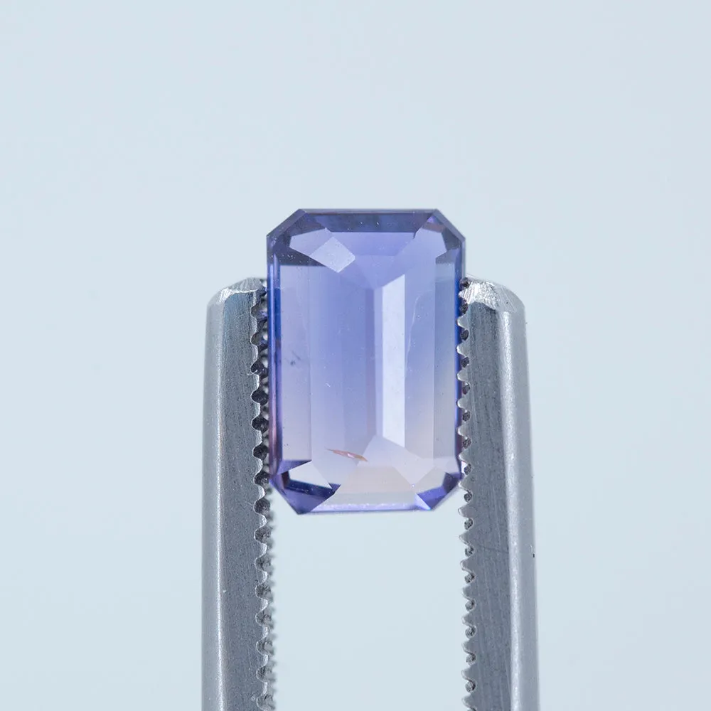 1.58CT EMERALD CUT TANZANIAN SAPPHIRE, BI-COLOR PURPLE, UNHEATED, 7.41X4.83MM