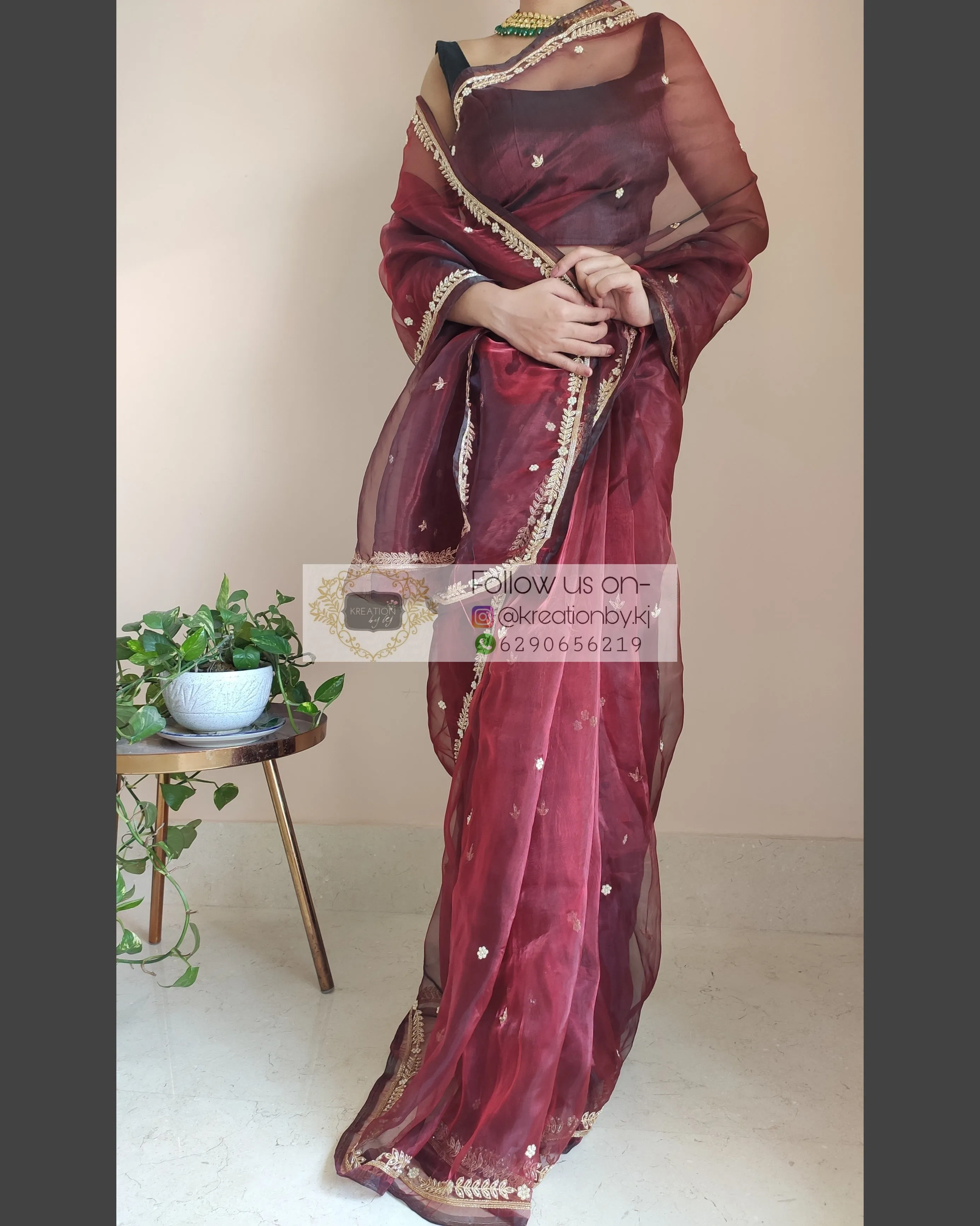 Maroon Glass Tissue Saree With Kasab And Cutdana Border